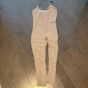 TNA Action butter jumpsuit taupe size small